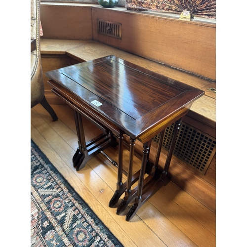 324 - Nest of three mahogany tables, raised on turned columns in the Victorian style. {59 cm H x  56 cm W ... 