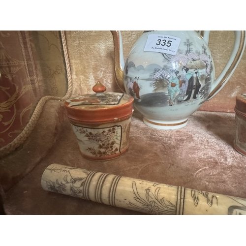 335 - Early 20th C. Oriental Hand painted tea pot and two lidded bowls. {19 cm H to 6 cm H}.