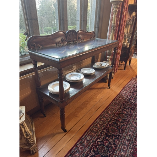 339 - Irish 19th. C. mahogany server with gallery back with shell decoration, raised on turned columns. {1... 