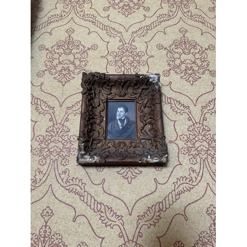 389 - Two 19th C. black and white portraits mounted in decorative giltwood frames {23 cm H x 20 cm W AND 2... 