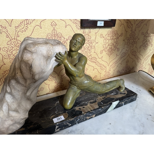 393 - Art Deco bronzed spelter and marble sculpture. 32 cm H x 67 cm W x 16 cm D}.