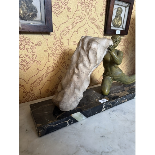 393 - Art Deco bronzed spelter and marble sculpture. 32 cm H x 67 cm W x 16 cm D}.