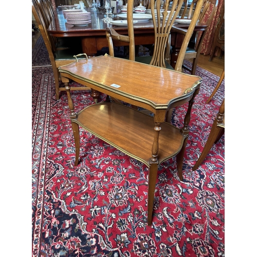 396 - Pair of Edwardian French mahogany and brass serving tables. {70 cm H x 67 cm W x 34 m D}