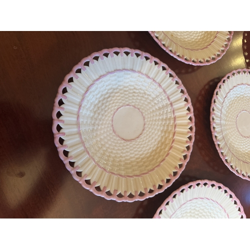 410 - Set of ten 2nd. Period Belleek Basket ware plates. {23 cm Dia}.