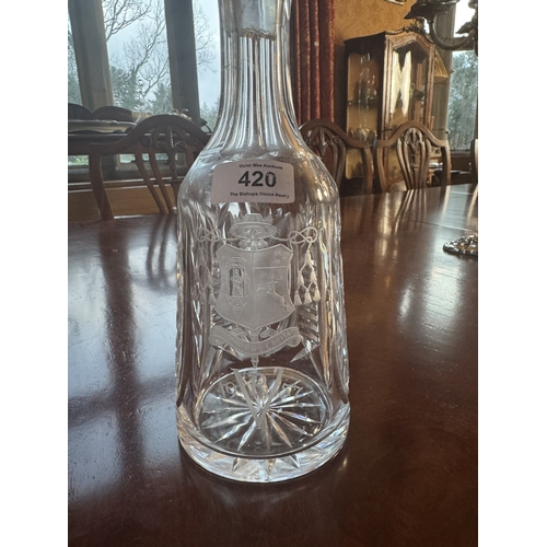 420 - Etched glass decanter with crest. {34 cm H x 10 cm Dia.}.