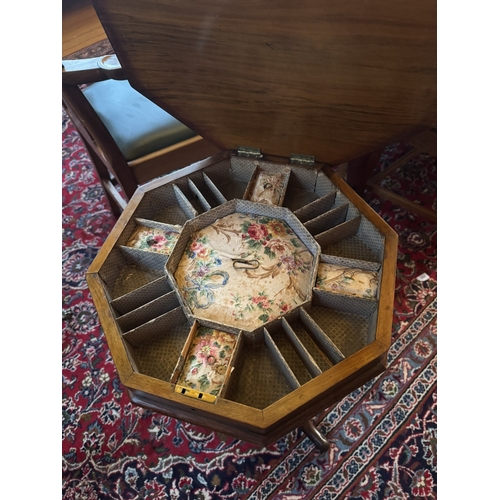 427 - 19th C. Rosewood sewing table,raised  on three outswept feet. {71 cm H x 43 cm W x 44 cm D}.