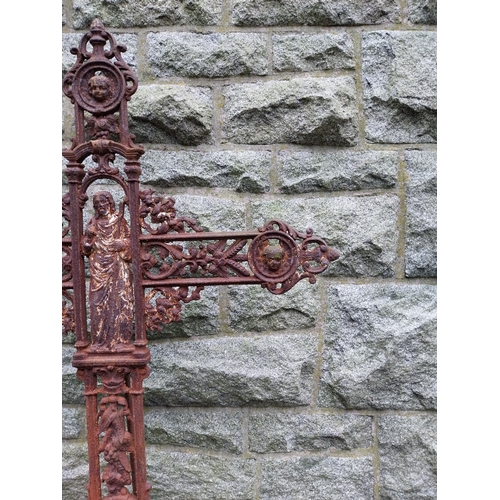 43 - 19th C. Decorative cast iron cross on limestone base. {196 cm H x 96 cm W x 38 cm D}.