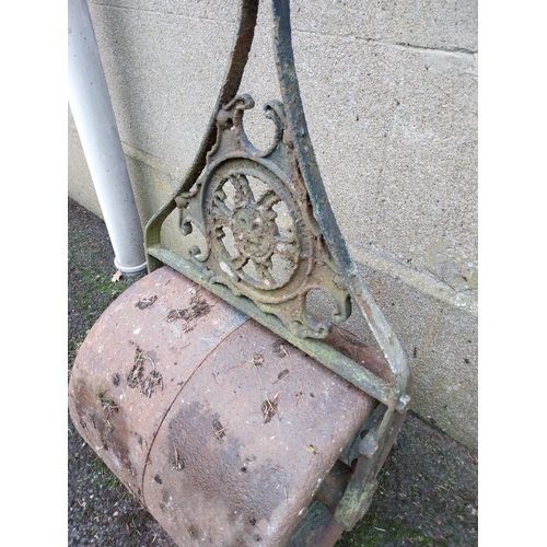 44 - Early 20th C. Cast iron garden roller. {113 cm H x 56 cm W x 44 cm D}.