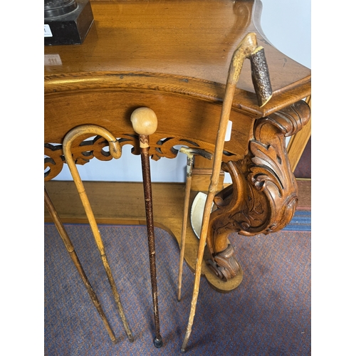 443 - Collection of five 19th & 20th C. walking canes - one with silver mount and one with gold mount.