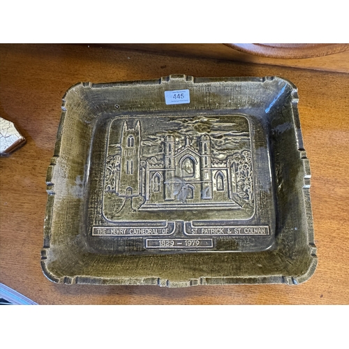 445 - Ceramic plate depicting Cathederal of Newry. {29 cm H x 36 cm W}.