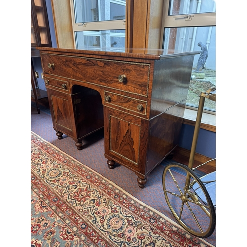 450 - Good quality Regency rosewood desk with giltwood surround doors and drawers. {82 cm H x 107 cm W x 5... 