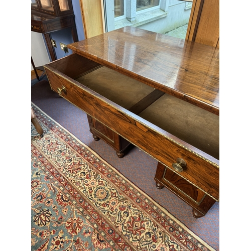 450 - Good quality Regency rosewood desk with giltwood surround doors and drawers. {82 cm H x 107 cm W x 5... 