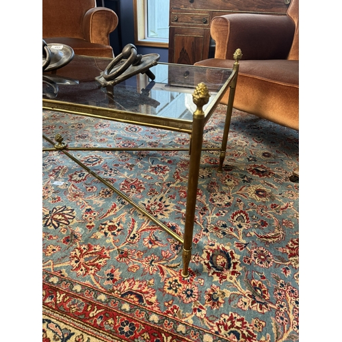 452 - Early 20th C. Brass coffee table with inset glass top in the Regency style. {48 cm H x 117 cm W x 57... 