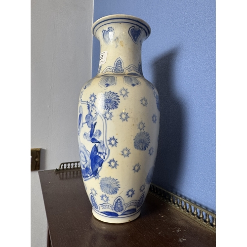 455 - 19th C oriental blue and white vase. {31 cm H x 14 cm Dia.}.