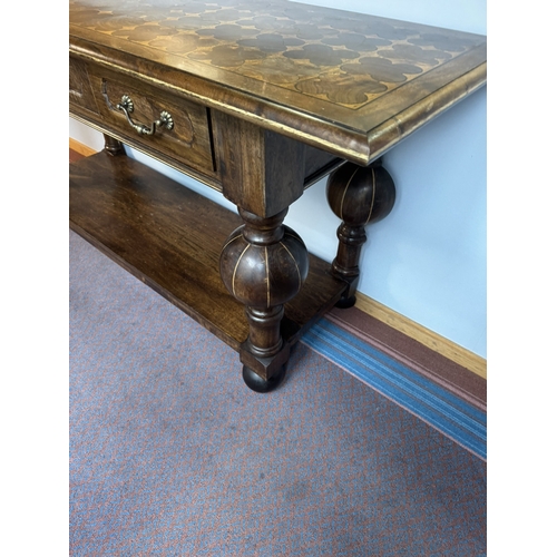 459 - Good quality specimen wood side table with three drawers in frieze on platform base in the Tudor sty... 