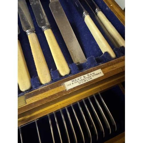 466 - Early 20th C. West and Son Grafton Street Dublin cased cutlery set. {24 cm H x 46 cm W x 35 cm D}.