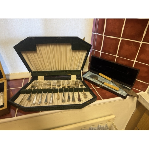 474 - Three cased sets of silver plate fish knives and forks and two cased cutlery sets.