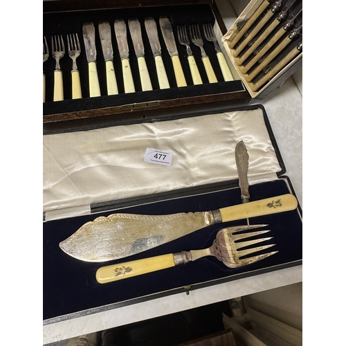 477 - Two cased silver plate fish knife and fork set and cased set of knives.