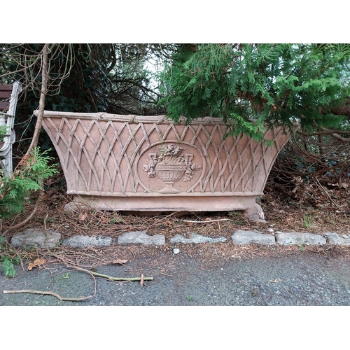 49 - Pair of moulded terracotta lattice design planters. {54 cm H x 177 cm