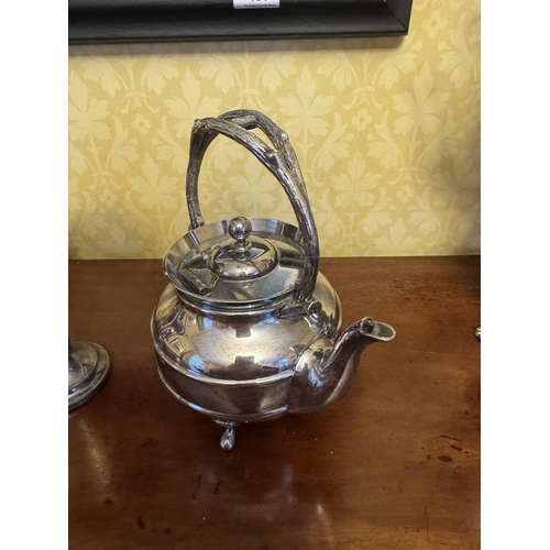 491 - Four pieces of early 20th C. Silver plate including cocktail shaker wine cooler and tea pot and vase... 