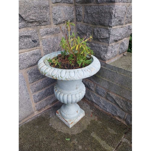 5 - Pair of cast iron garden urns. {76 cm H x 55 cm Dia.}.