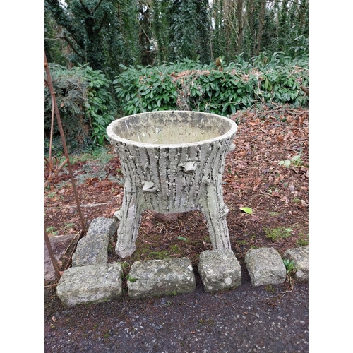 50 - Pair of unusual moulded stone planters in the form of tree trunks. {47 cm H x 46 cm Dia.}.