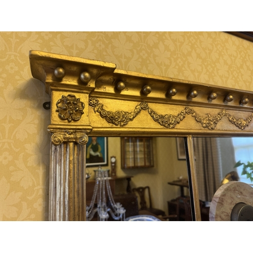 513 - Regency giltwood overmantle by Strahan of Dublin. {52 cm H x 136 cm W}.