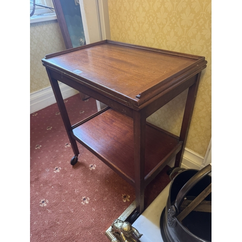 517 - 1950's mahogany serving trolley. {71 cm H x 61 cm W x 40 cm D}.