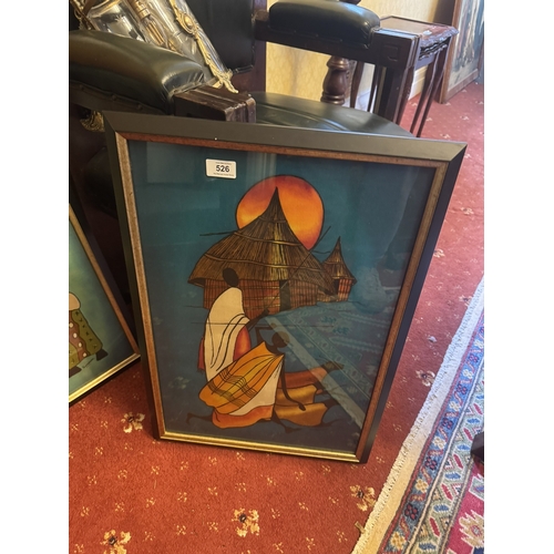 526 - Pair of coloured African prints mounted in ebonised frames. {63 cm H x 45 cm D}.