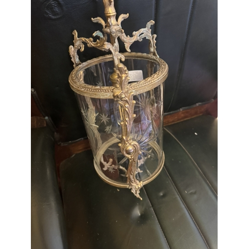 527 - 1950's gilded brass and glass hanging hall lantern. {73 cm H x 16 cm Dia.}.