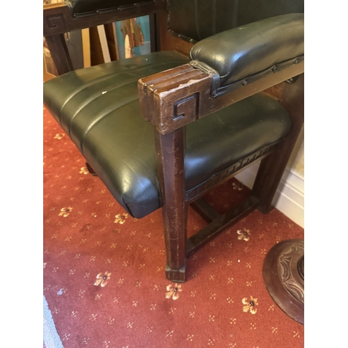 528 - 1950's mahogany and leather upholstered throne chair. {118 cm H x 64 cm W x 56 cm D}.