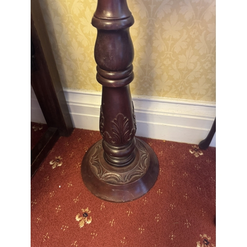 529 - Carved mahogany jardiniere stand in the William IV style. {75 cm H x 25 cm Dia.}.