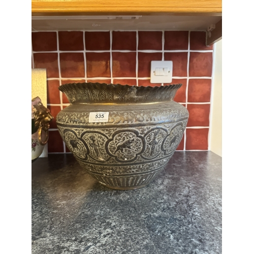 535 - Indian etched brass jardiniere  and ceramic jardiniere. {26 cm H x 35 cm W and 34 cm W x 26 cm D}.