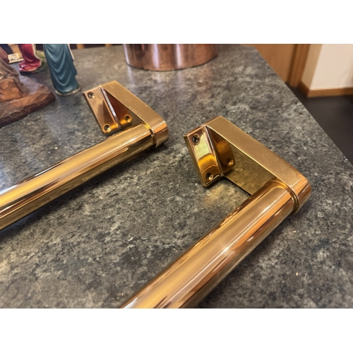 545 - Pair of good quality bronze Art Deco door handles. {46 cm H}.