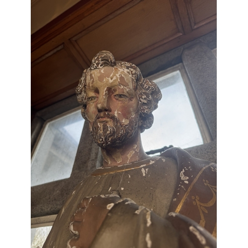 566 - 19th. C.carved wooden statue of Joseph, mounted on matching base. { 130cm H X 41cm Sq. }.