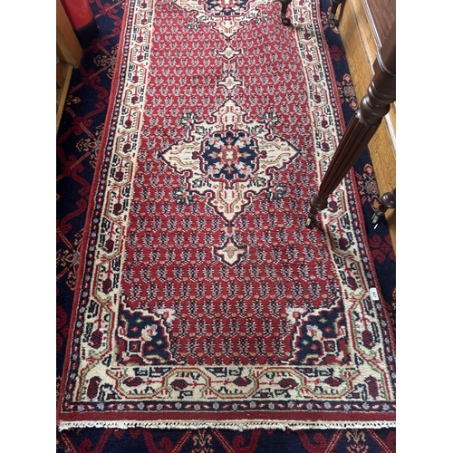 568 - Good quality hand knotted pure wool carpet runner. { 350cm L X 293cm W }.