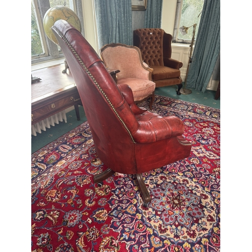 583 - Good quality hand dyed French ox blood leather deep buttoned swivel office chair  with brass stud de... 