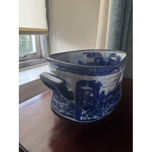 594 - Blue and white ceramic jardiniere. { 18cm H X 41cm W X 27cm D }.