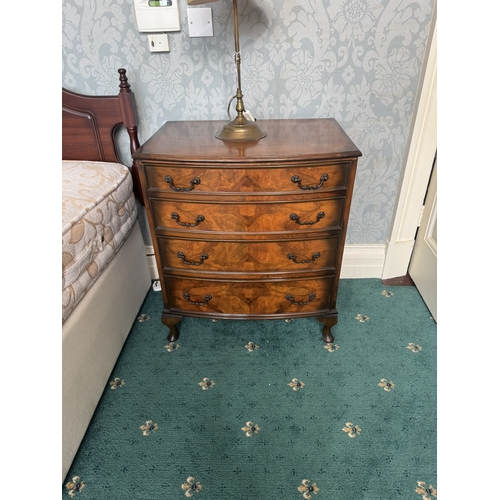 600 - Pair of walnut bow fronted bedside chests, the four graduated drawers with burr walnut, raised on Qu... 