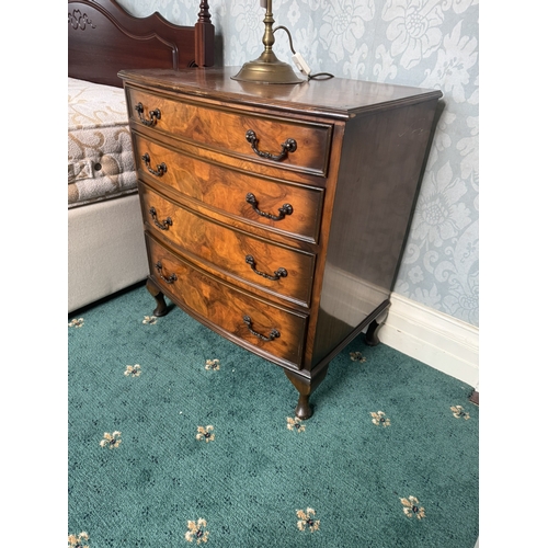 600 - Pair of walnut bow fronted bedside chests, the four graduated drawers with burr walnut, raised on Qu... 