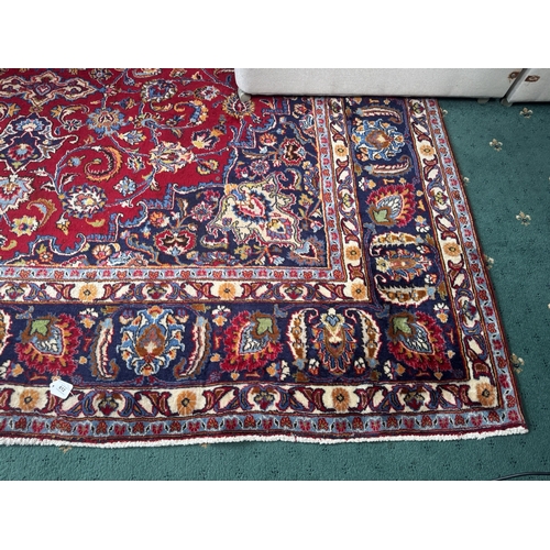 612 - Good quality hand knotted carpet square { 388cm L X 289cm W }.