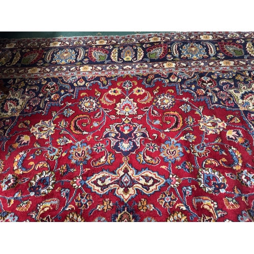 612 - Good quality hand knotted carpet square { 388cm L X 289cm W }.