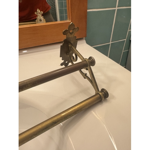 623 - 20th. C. brass wall mounted towel rail. { 12cm H X 68cm W X 13cm D }.