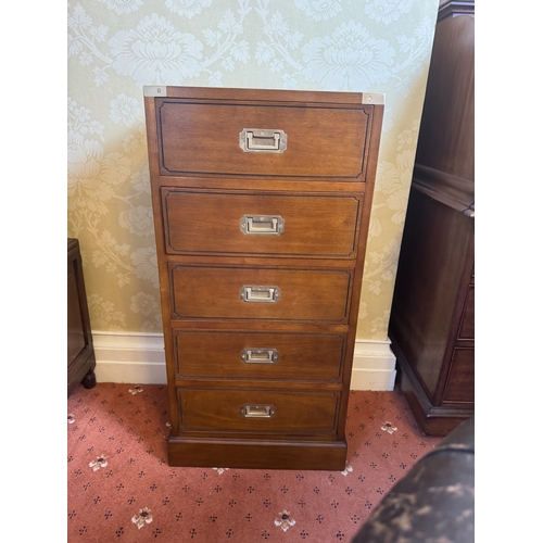 629 - Pair of mahogany campaign chest with five short drawers and brass mounts, raised on plinth bases. { ... 