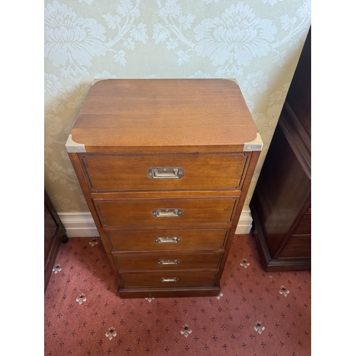 629 - Pair of mahogany campaign chest with five short drawers and brass mounts, raised on plinth bases. { ... 