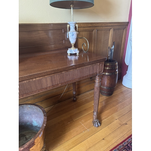 64 - Irish Georgian mahogany Cork server, with gallery back reeded apron, raised on turned reeded tapered... 