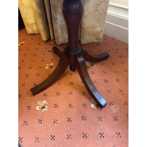 643 - Georgian mahogany wine table on later turned column and three ouswept legs . { 47cm H X 51cm Dia}.