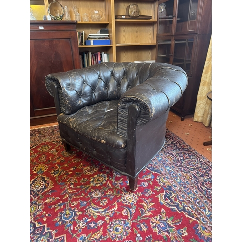 645 - Pair of 19th C hand dyed leather deep buttoned Chesterfield club chairs on tapered feet and castors.... 