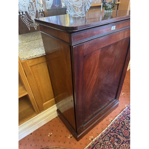 651 - Early 19th. C. mahogany cupboard with single panelled door, raised on plinth base. { 114cm H X 74cm ... 