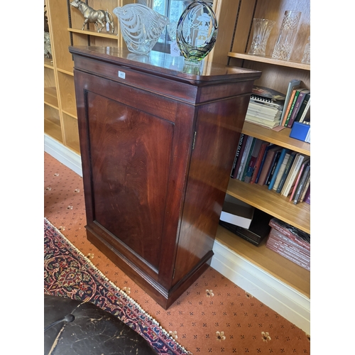 651 - Early 19th. C. mahogany cupboard with single panelled door, raised on plinth base. { 114cm H X 74cm ... 